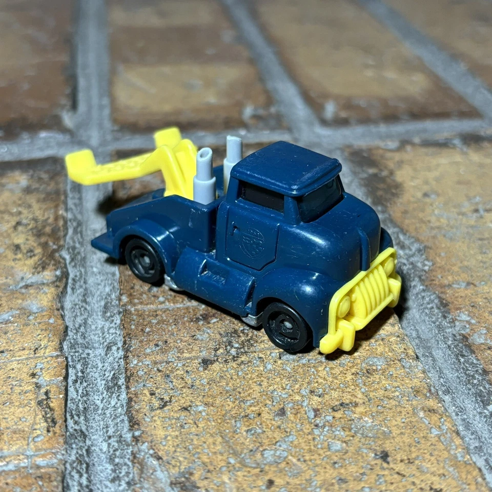 Camión de remolque fundido a presión amarillo azul oscuro 1994 Hot Wheels 1:64 ✅ Mattel Inc. Foto 1 de 4