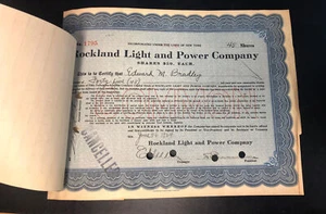 Estampillas fiscales vintage de certificado de acciones de Rockland Light & Power Company con orden de transferencia - Imagen 1 de 4