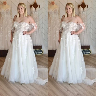 Vestidos de novia clásicos con apliques de encaje al hombro descubiertos vestidos de novia tren de barrido Foto 1 de 4