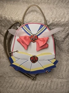 Boxlunch Exclusive Fashion Collect. Sailor Moon Tuxedo Reversible Mini Backpack  - Picture 1 of 19