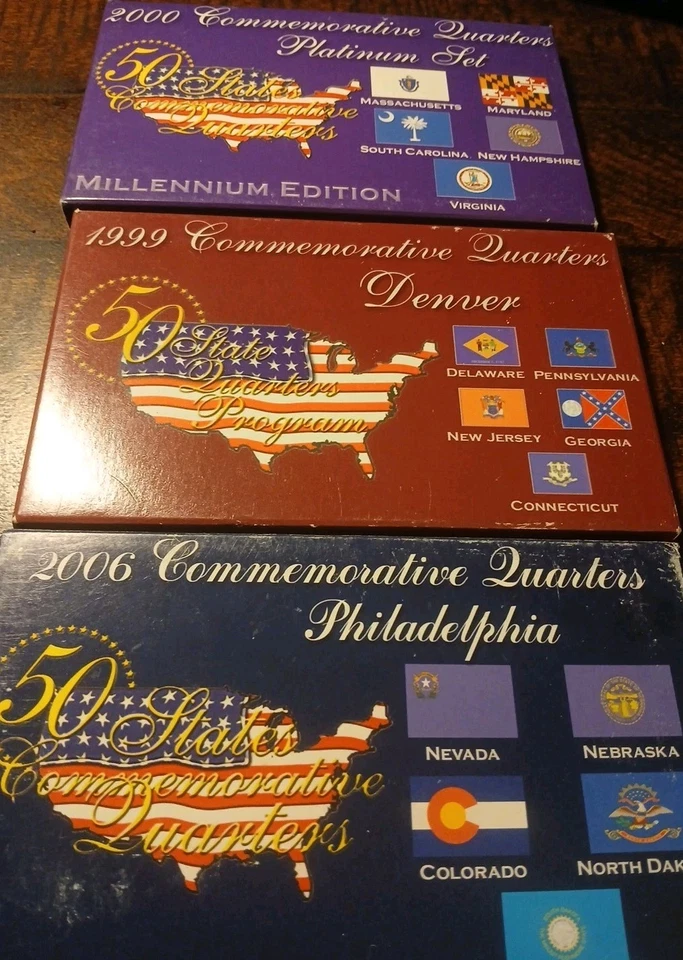 3 Commemorative Quarter Sets. 1999 Denver 2006 Philly And a 2000 Platinum Set... - Image 1 of 4