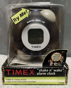 Reloj despertador redondo Timex Shake N Wake T156B 7 frases de personajes extravagantes NIOB - Imagen 1 de 7