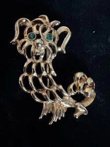 Broche Avon tono dorado para perro con pedrería de ojos verdes - Imagen 1 de 4