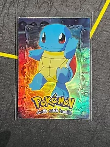 1999 Topps Movie Edition Squirtle #7 Rainbow Foil Blue Logo E7 of 12 NM-LP - Foto 1 di 2