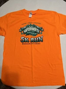 McGuires Irish Pub Shirt L Orange W/ Graphic “2016 St. Patrick’s Day Run” - Picture 1 of 2