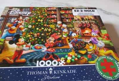 1,000 Piece Disney/ Puzzle "Mickey + Minnie Trimming the Tree" 30"X27" Kinkade - Image 1 of 4