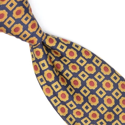 Corbata de seda italiana Coach para hombre azul marino dorado cobre estampado geométrico corbata  Foto 1 de 4