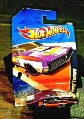 2012 HOT WHEELS PURPLE '70 FORD TORINO MATTEL  NEW IN FACTORY SEALED PACKAGE  - Image 1 of 3