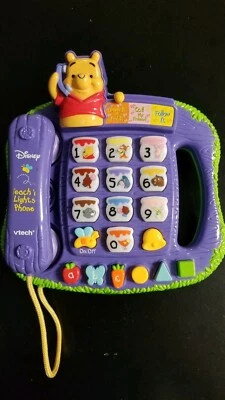 Vtech WINNIE THE POOH- TEACH' N LIGHTS PHONE - Image 1 of 4