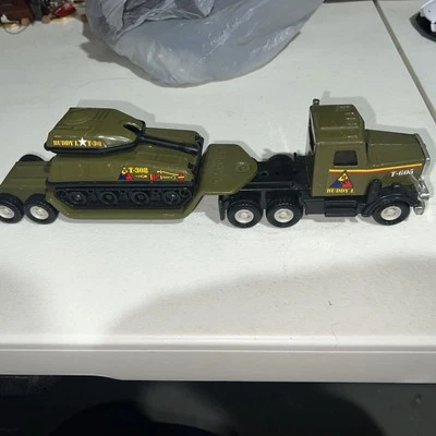 Vintage Buddy L Military Steel & Plastic Lowboy Trailer & Tractor w/ HQ4929 Tank - Image 1 of 4