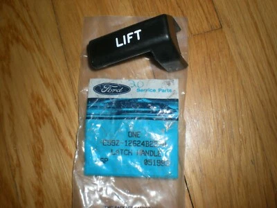 Manija de pestillo trasero derecho para asiento trasero Ford Aerostar 1989 E99Z-12624B22-A como nuevo de lote Foto 1 de 2