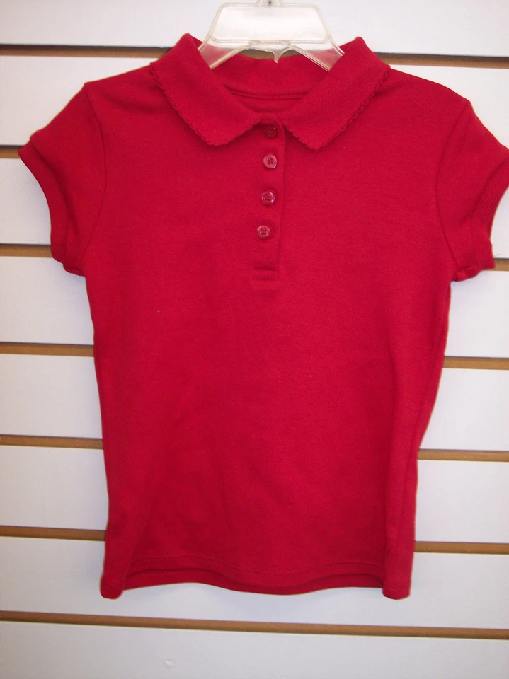 Camisas polo Dockers rojas o azules para niñas tallas 4-12/14 Foto 1 de 1