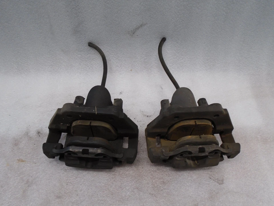 MONTAJE PINZA FRENO TRASERO IZQUIERDO Y DERECHO BMW 745LI 2002-2005 46/24 OEM TP61068 Foto 1 de 4