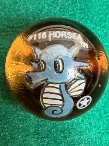 Vintage Pokemon #116 Horsea 1st First Edition Amber Clear Glass Marbles ToyBiz - Picture 1 of 3