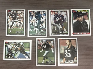 Lote de 7 tarjetas del equipo de fútbol americano Topps 1991 Oakland Raiders Ronnie Lott + Más - Imagen 1 de 2
