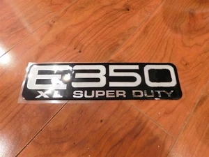 1999 - 2005 FORD ECONOLINE CLUB WAGON E-350 XL SUPERDUTY REAR EMBLEM NAMEPLATE - Picture 1 of 3