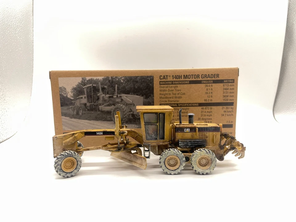 Cat 140H Motor Grader Muddy Veries 1/50 Metal Model By DieCast Masters DM 85030C - Image 1 of 4