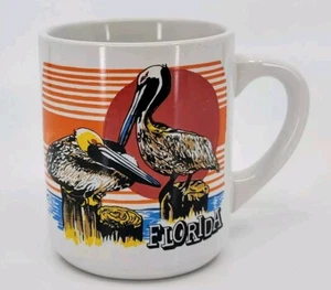 Florida Souvenir Coffee Mug Ceramic Vintage Pelican Sunset Ocean Pier Dock - Picture 1 of 4
