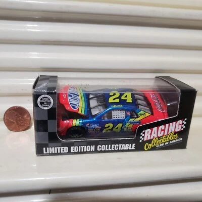 Action Racing 1/64 #24 JEFF GORDON DUPONT COCA COLA Hood OPEN Chevy Monte Carlo - Image 1 of 4