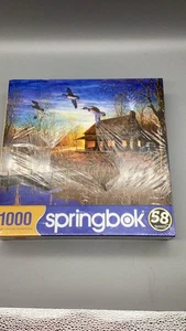 Springbok 1000pc JigsawPuzzle Hunting Lodge Ducks Cabin cover plastic ripped new - Picture 1 of 8