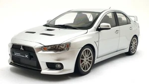 Sun Star scala 1/18 pressofuso 5821 Mitsubishi Lancer Evolution X (LHD) Met. Argento - Foto 1 di 5