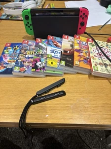 Consola portátil Nintendo Switch HAC-001 con Joy Cons y 7 juegos - Imagen 1 de 8