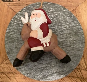 Midwest of Cannon Falls Eddie Walker Santa Riding a Reindeer Ornament - Picture 1 of 4