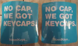 2x Genuine Novel Keys_ Stickers: "No cap, we got keycaps." - Picture 1 of 1