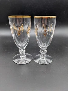 Dos (2) vasos de jugo Tiffin-Franciscan patrón chalet borde dorado patas 5" de alto - Imagen 1 de 12