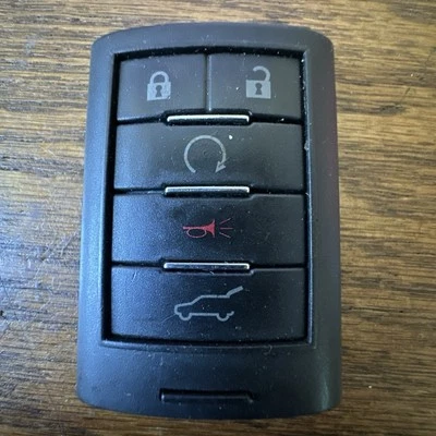 Mando a distancia con llave inteligente Cadillac SRX 2010-14 OEM FCC: NBG009768T 13502537 Foto 1 de 4