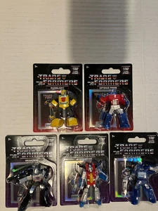 TRANS FORMERS - THE COMPLETE SET OF 5 2.5" PLASTIC FIGURES - Picture 1 of 1