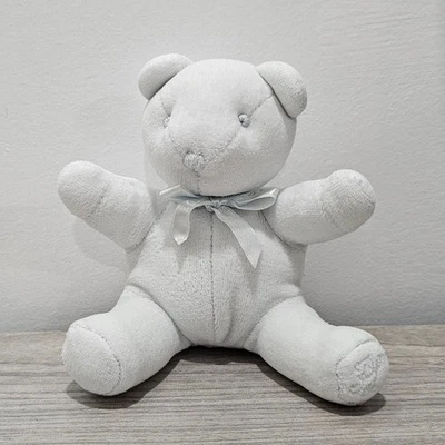 Oso de peluche Ralph Lauren azul pastel pálido felpa ojos cosidos arco pequeño mini sonajero Foto 1 de 4
