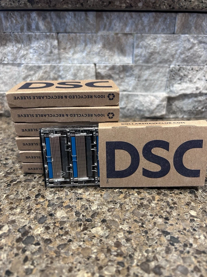 Cartuchos de hoja de afeitar Dollar Shave Club serie 6 hojas extra cerradas, paquetes de 7 Foto 1 de 1