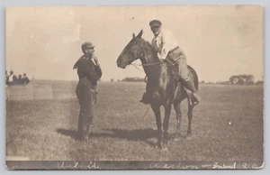 Western Kansas? RPPC Postcard: Cowboys, Horse in Field, 1910 - Picture 1 of 2