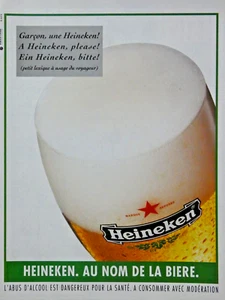PUBLICITÉ DE PRESSE 1994 GARCON UNE HEINEKEN AU NOM DE LA BIÈRE - Foto 1 di 1