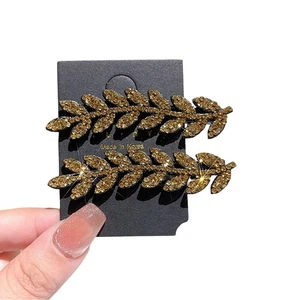 Clips laterales de pedrería de moda para levantar tu peinado sin esfuerzo - Imagen 1 de 16