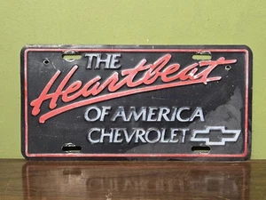 Etiqueta metálica en relieve de colección Chevrolet GM CONCESIONARIO HEARTBEAT OF AMERICA - Imagen 1 de 2