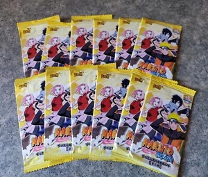 12 buste booster premium gialle gioco carte collezionabili NARUTO - Foto 1 di 3