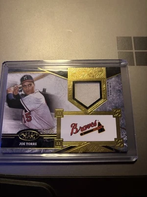 Reliquia usada del juego Joe Torre 2025 Topps Tier One Braves 9/25 Foto 1 de 2