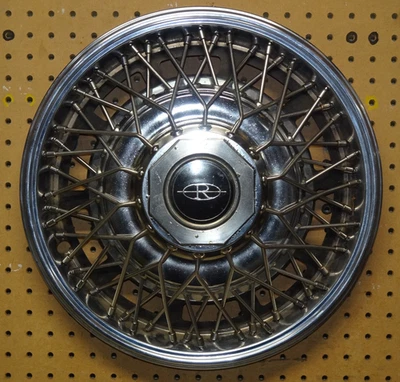 (1) Buick Riviera # 1099 1979-1985 tapacubos de cable de radios de 15"/cubierta de rueda Foto 1 de 4
