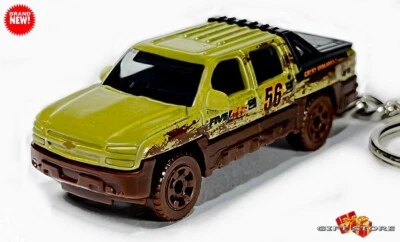 🎁🎁RARE KEYCHAIN GREEN BROWN CHEVY AVALANCHE Z71 CUSTOM Ltd. Ed. GREAT GIFT🎁🎁 - Image 1 of 4