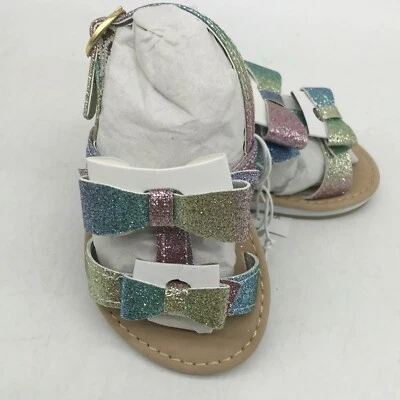 Sandalias planas multicolores con lazo brillante talla 4 The Childrens Place para niñas pequeñas Foto 1 de 4