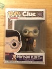 professer plum with the rope 48 funko comes with Protector.