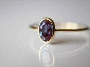 Stunning Oval Cut 0.50Ct Simulated Alexandrite Pure 10K Yellow Gold Women Ring - Picture 1 of 8