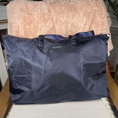 Bolso de Mano TUMI Voyageur “Just In Case” Bolso de Viaje Ligero Embalable Azul Marino Foto 1 de 4