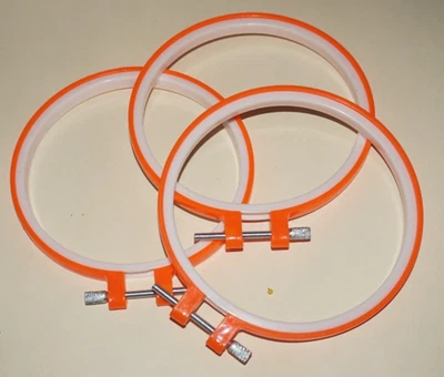 Three, 4" Diameter, Plastic, Orange and White, Round Hoops with Metal Screws - Image 1 of 2
