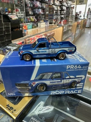 Camioneta pickup Datsun Pandem 620 #66 azul modelo diecast 1/64 de Pop Race Pr640217 Foto 1 de 4