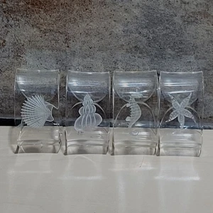 Juego de 4 anillos de servilleta de acrílico transparente tema náutico estrellas de mar caballito de mar concha almeja - Imagen 1 de 11