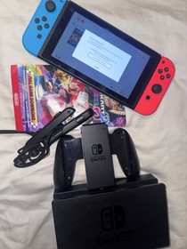 Nintendo Switch HAC-001(-01) with Blue and Red Joy-Con Controllers and Mario...