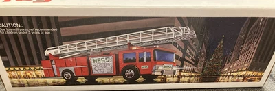 Banco de camión escalera de bomberos rojo juguete HESS 1986 de colección en caja original Foto 1 de 4